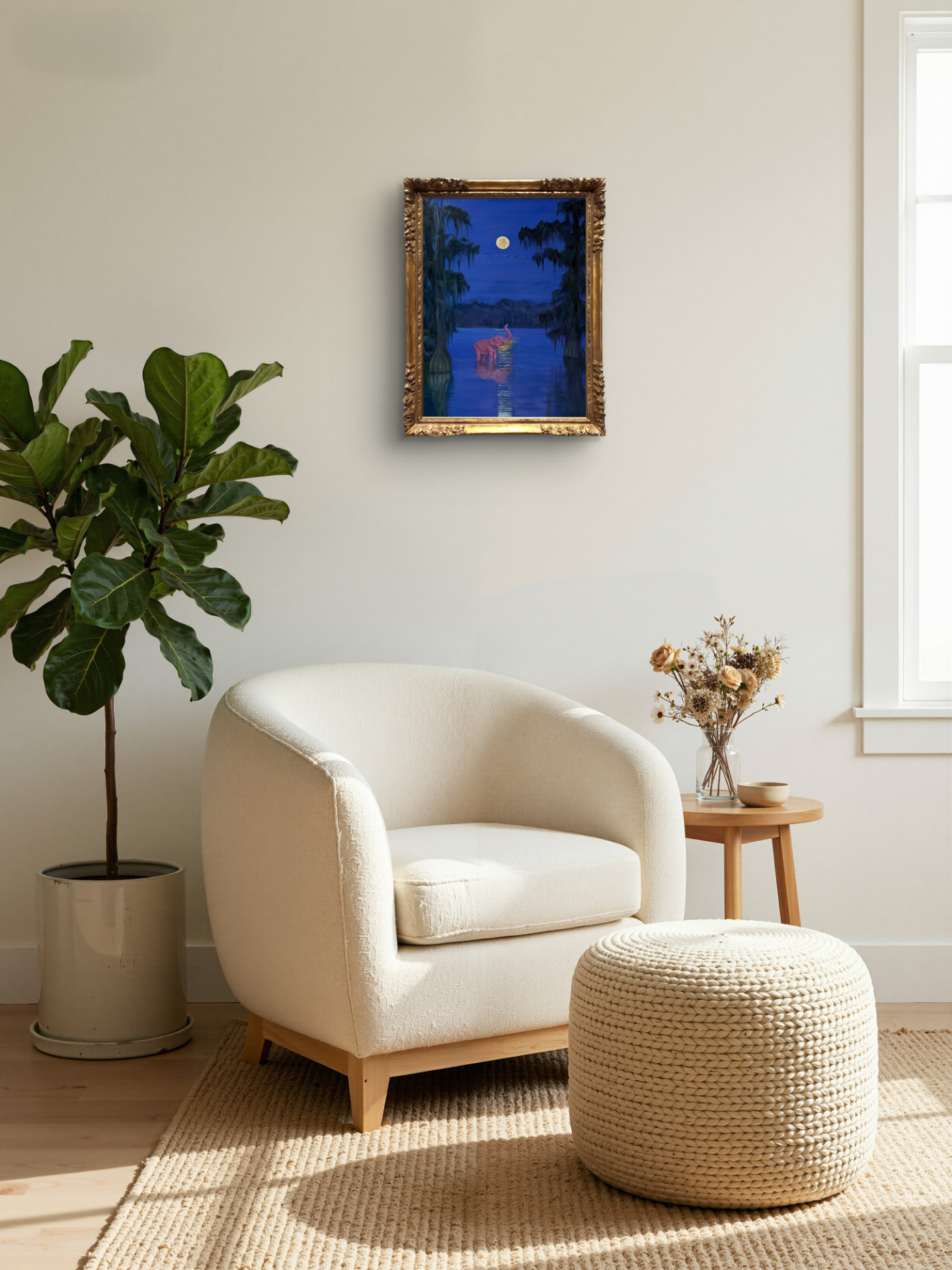 A gilt-framed moonlit bayou painting with a pink elephant